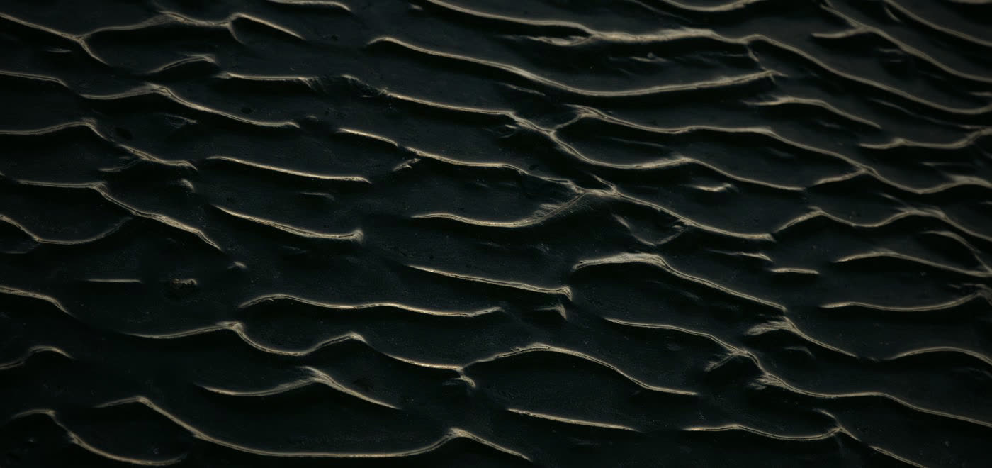 Abstract dark ripple texture